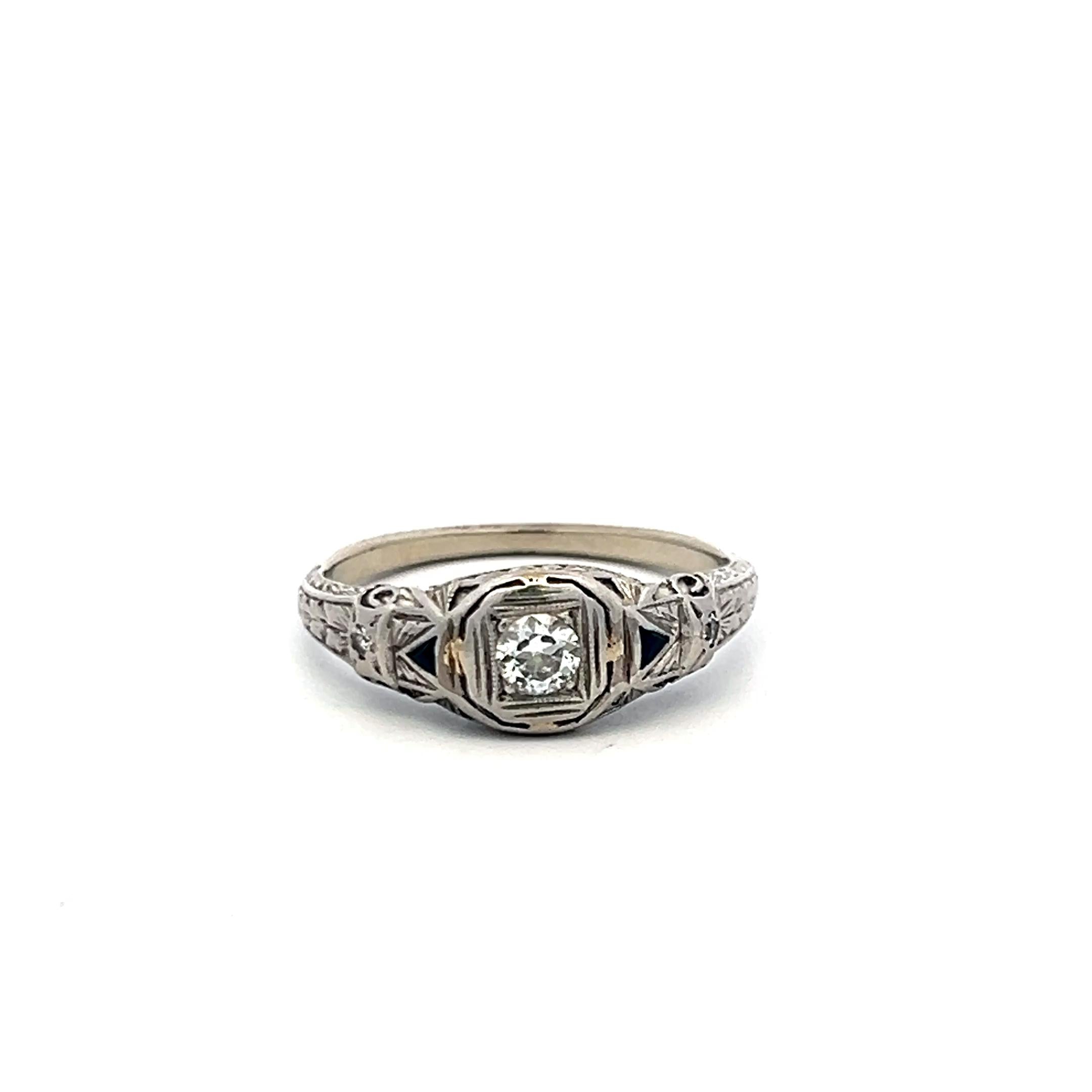Art Deco Platinum Ring with 0.25ct Old European Cut Diamond and 0.04ct Sapphire