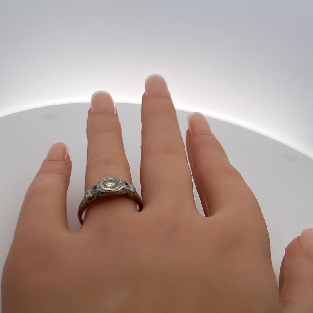 Art Deco Platinum Ring with 0.25ct Old European Cut Diamond and 0.04ct Sapphire