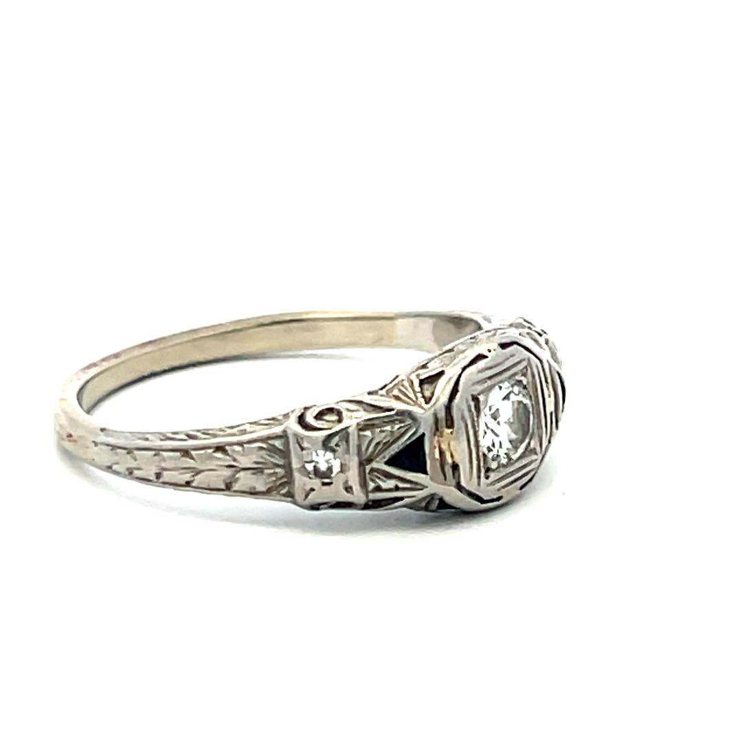 Art Deco Platinum Ring with 0.25ct Old European Cut Diamond and 0.04ct Sapphire
