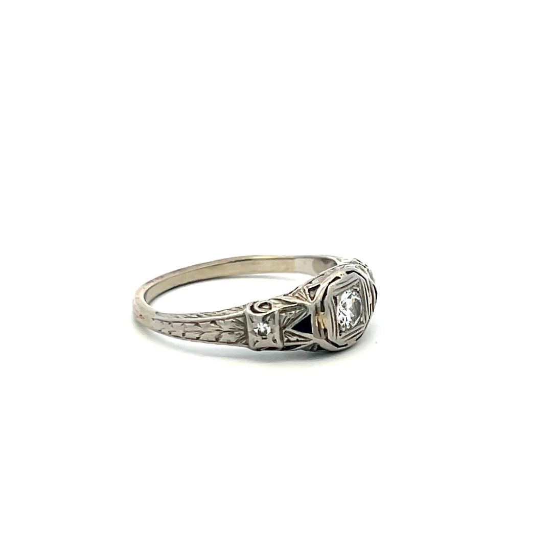 Art Deco Platinum Ring with 0.25ct Old European Cut Diamond and 0.04ct Sapphire