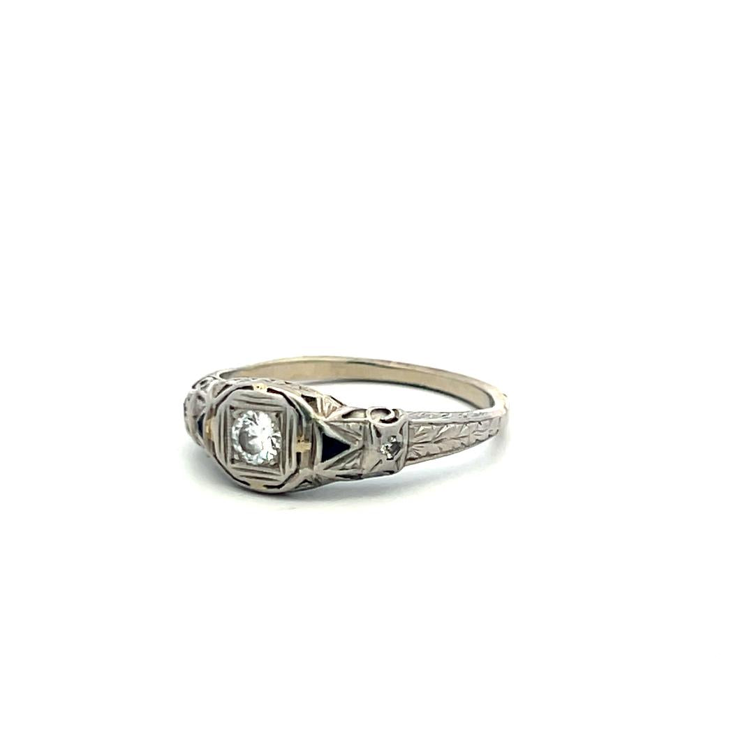 Art Deco Platinum Ring with 0.25ct Old European Cut Diamond and 0.04ct Sapphire