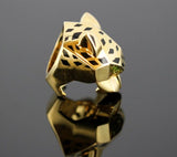 Cartier Vintage 65.50 Grams 4.50 Carat Peridot and Onyx 18 Karat Yellow Gold Ring