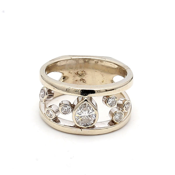 0.80 Carat Pear Shape H SI1 and Round Brilliant I I1 Diamond 14 Karat White Gold Fashion Ring