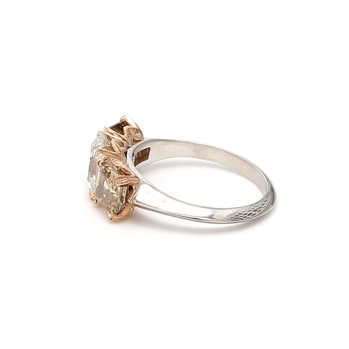 4.06 Carat Asscher Cut Fancy Y-O-B Diamond 18K Gold Three-Stone Ring