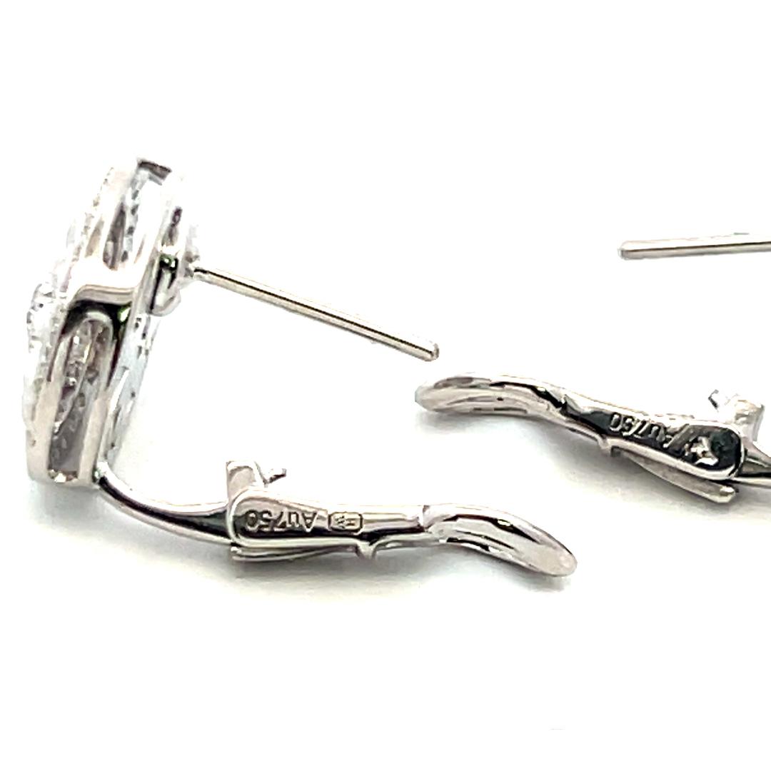 Harry Winston Platinum Clip On Earrings with 0.55 Carat Round F-VS1 Diamonds