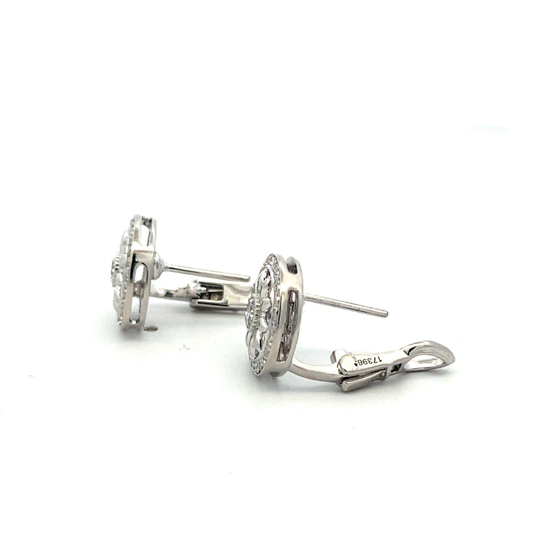 Harry Winston Platinum Clip On Earrings with 0.55 Carat Round F-VS1 Diamonds