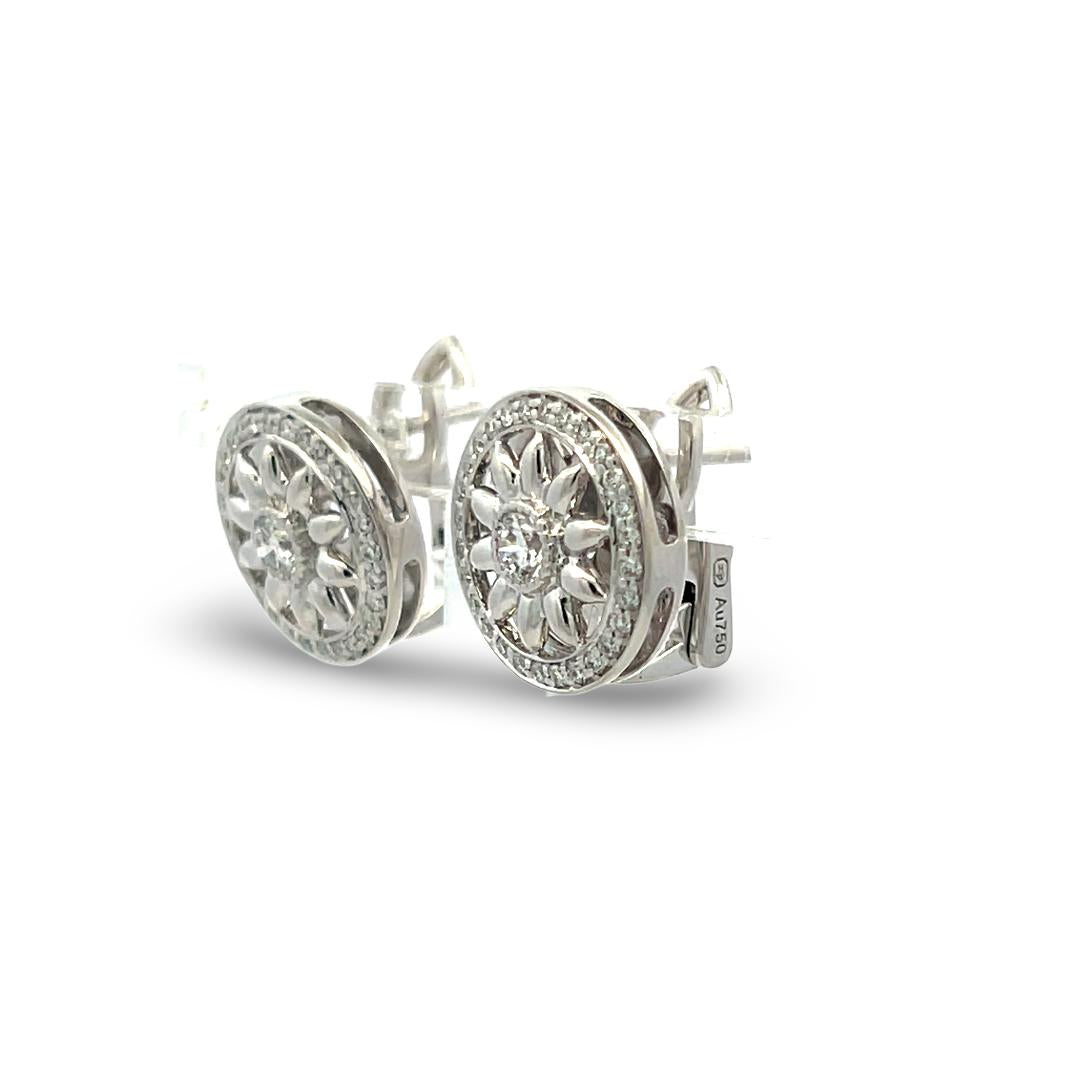 Harry Winston Platinum Clip On Earrings with 0.55 Carat Round F-VS1 Diamonds