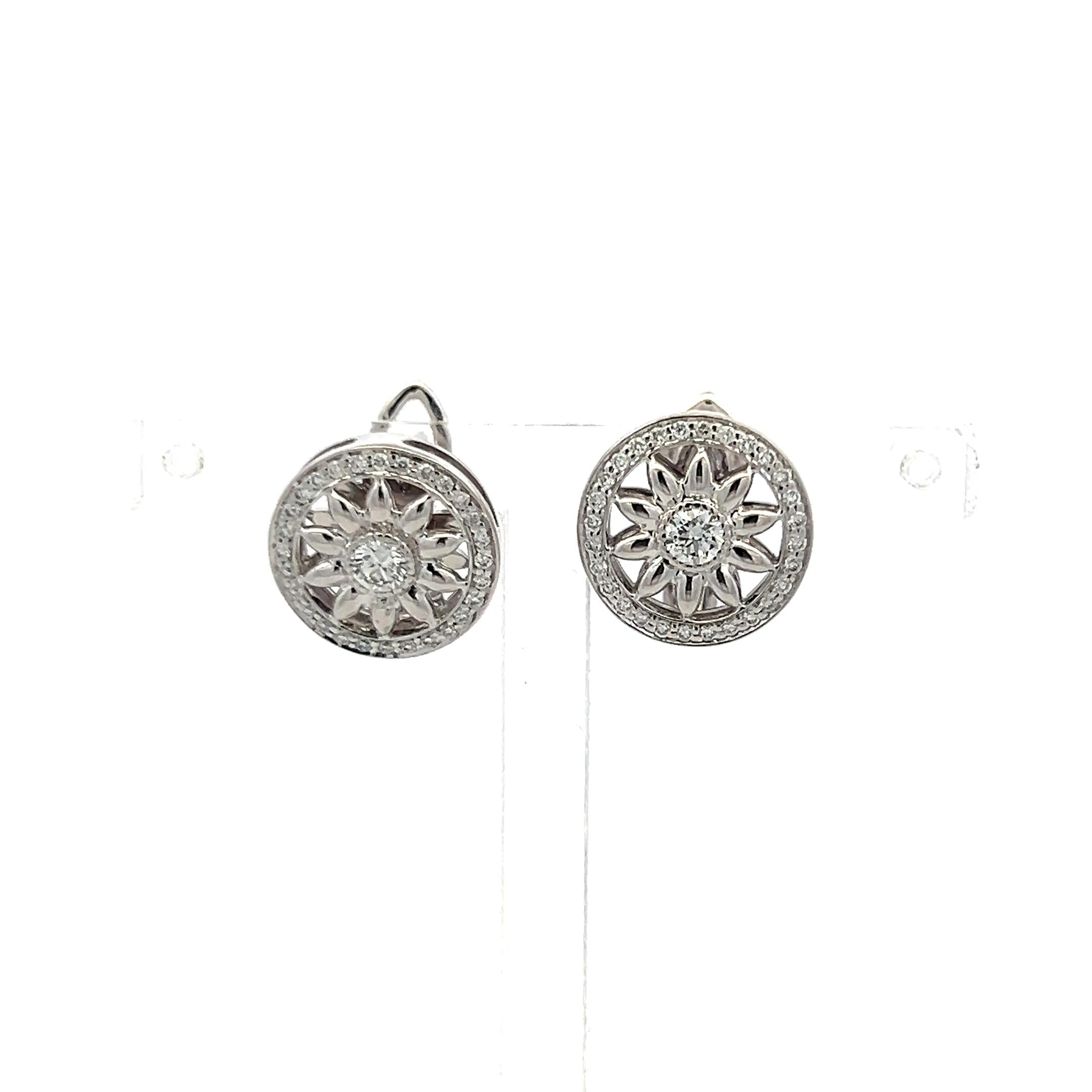 Harry Winston Platinum Clip On Earrings with 0.55 Carat Round F-VS1 Diamonds