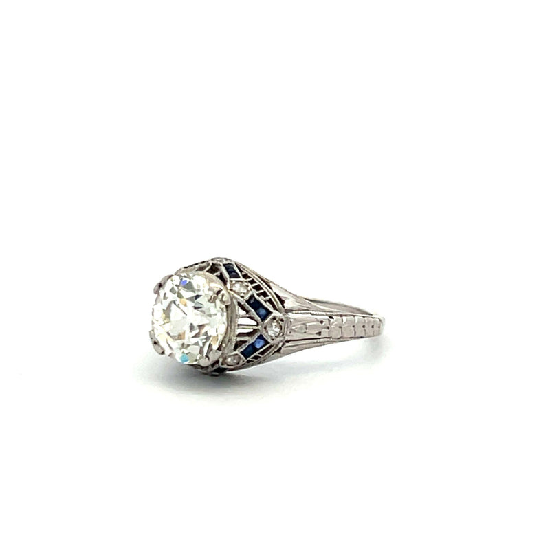 1.74 Carat Old European and Round Diamond 0.08 Carat Sapphire Plat Art Deco Ring