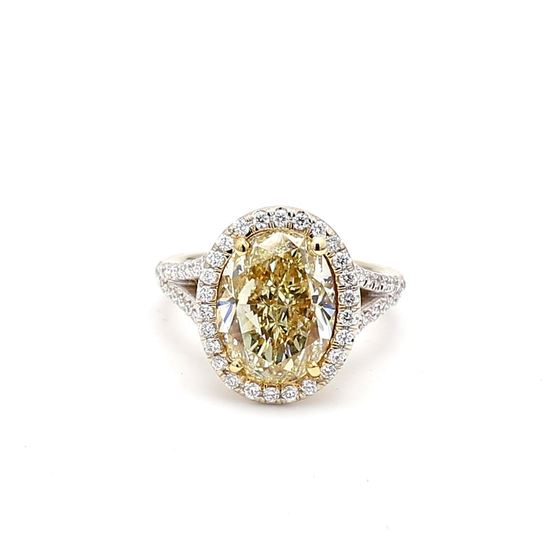 5.74 Carat Oval Fancy light yellow and Round Diamond 18K YG Engagement Ring
