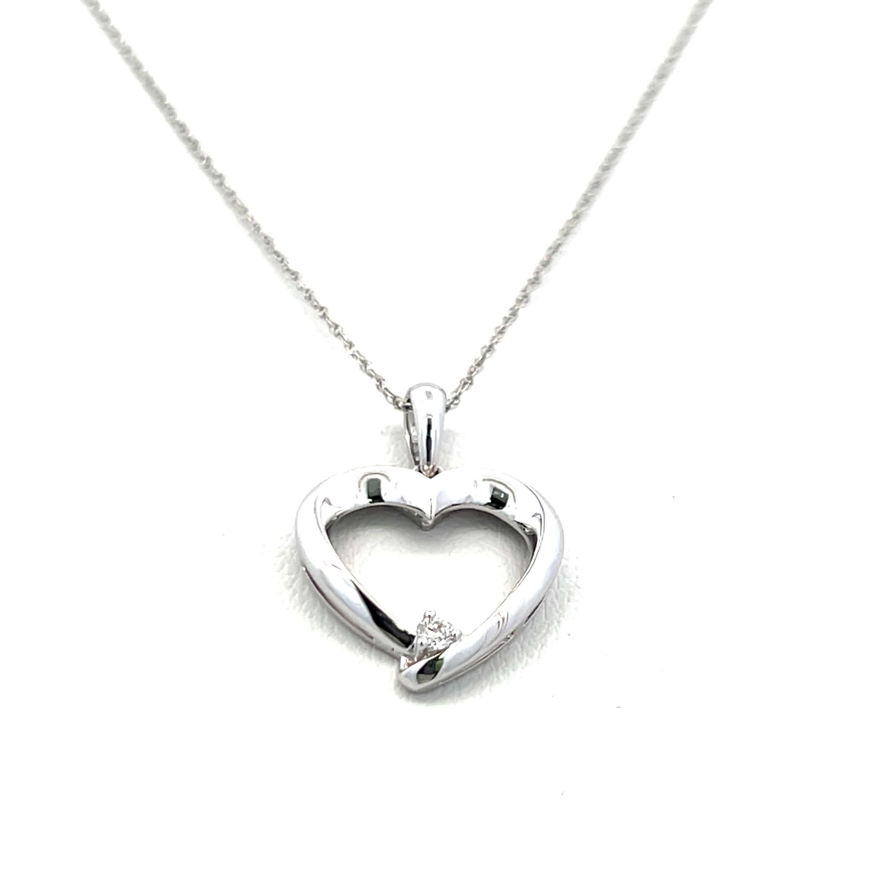 0.03 Carat Round Brilliant G VS1 Diamond 14 Karat White Gold Pendant Necklace