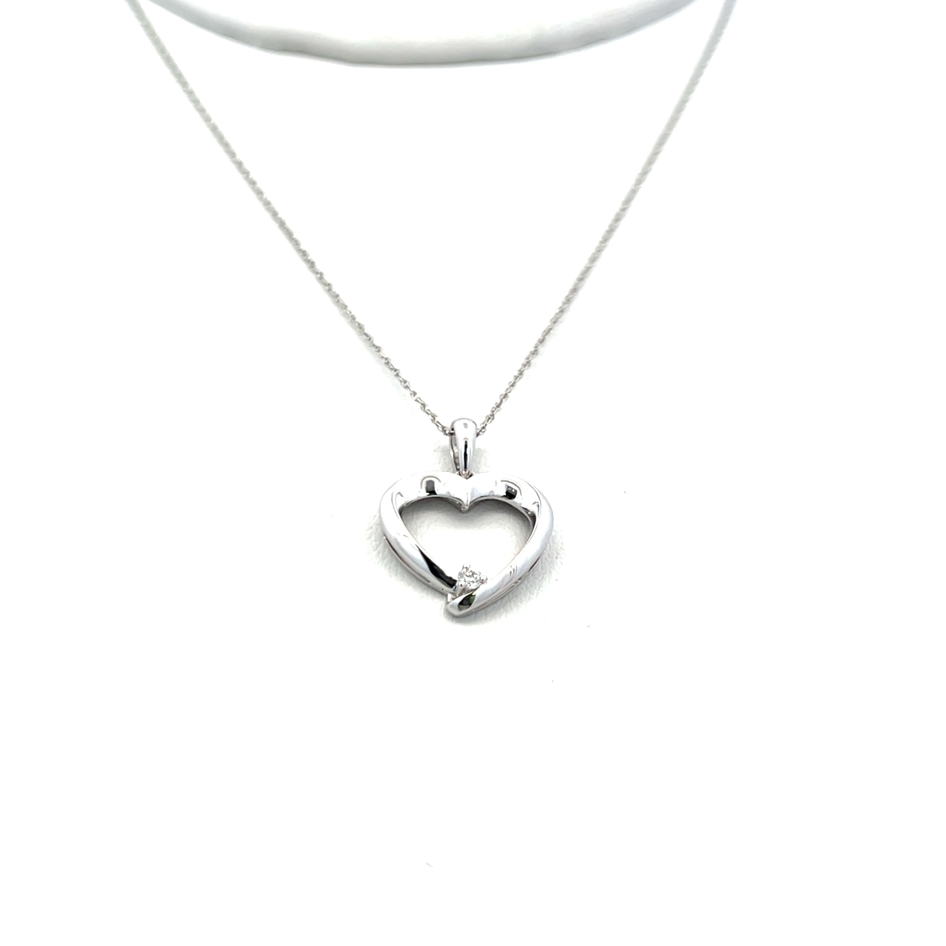 0.03 Carat Round Brilliant G VS1 Diamond 14 Karat White Gold Pendant Necklace