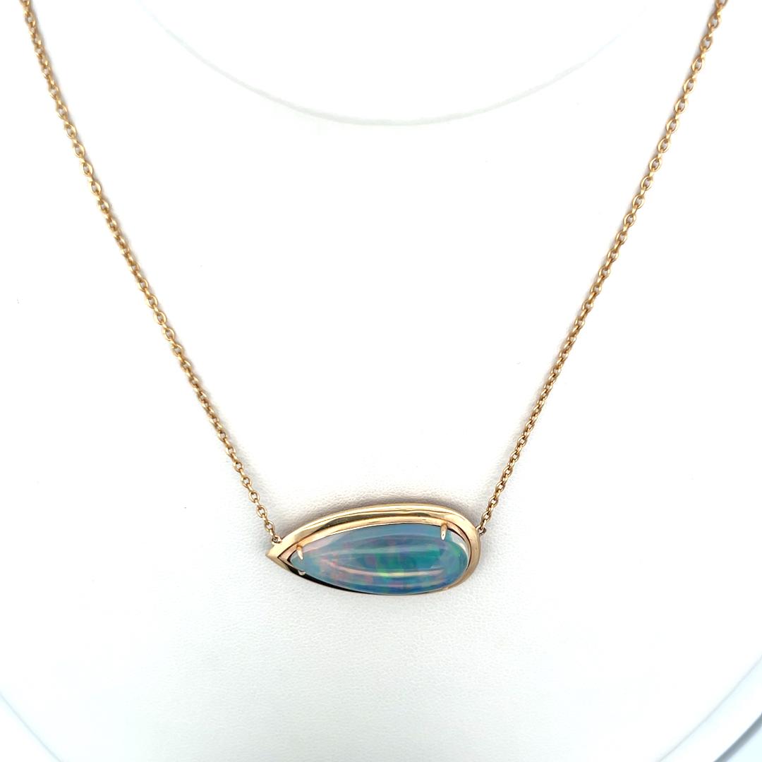 8.63 Carat Pear Shape Opal 14 Karat Yellow Gold Pendant Necklace