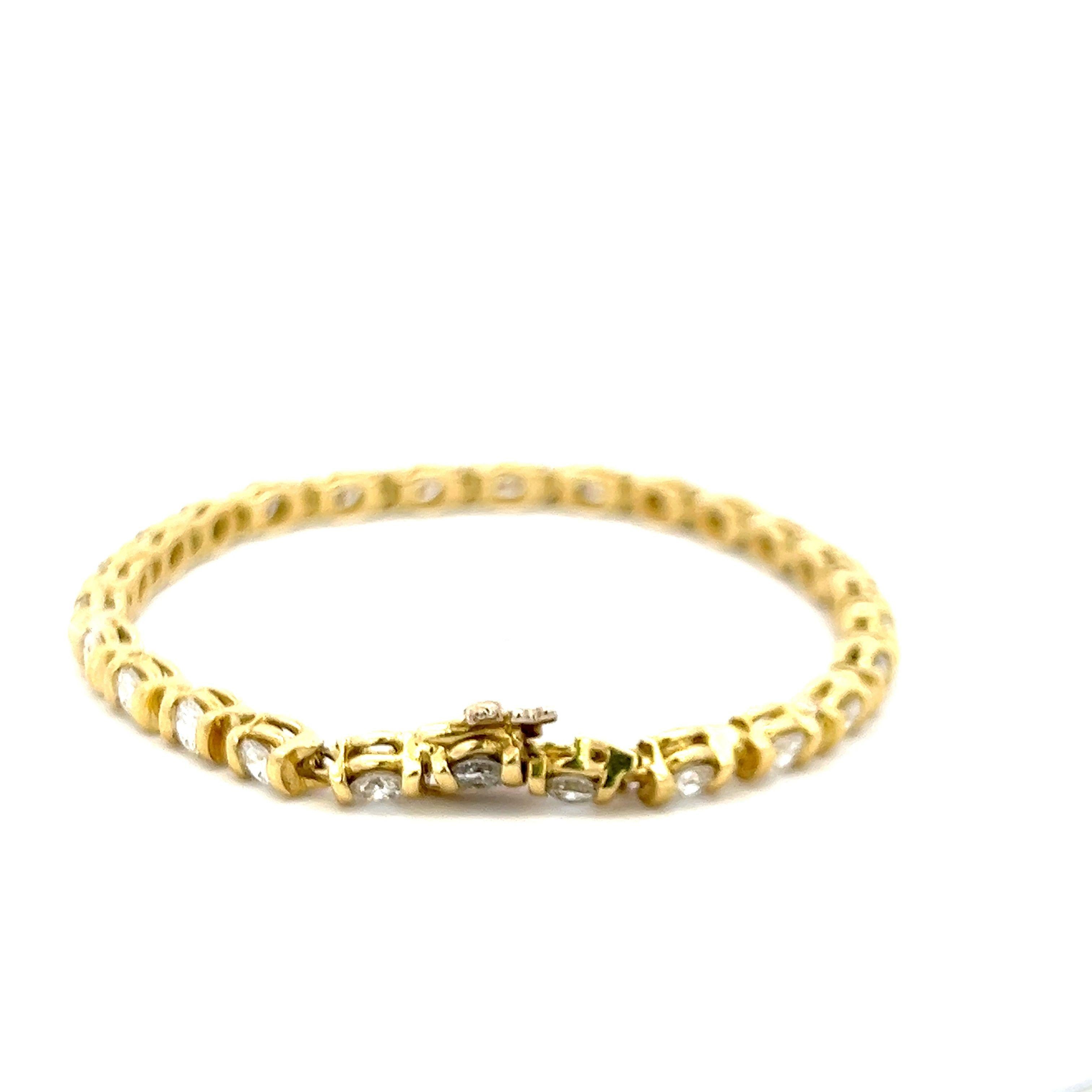 4.20 Carat Round Brilliant H VS1 Diamond 18 Karat Yellow Gold Tennis Bracelet