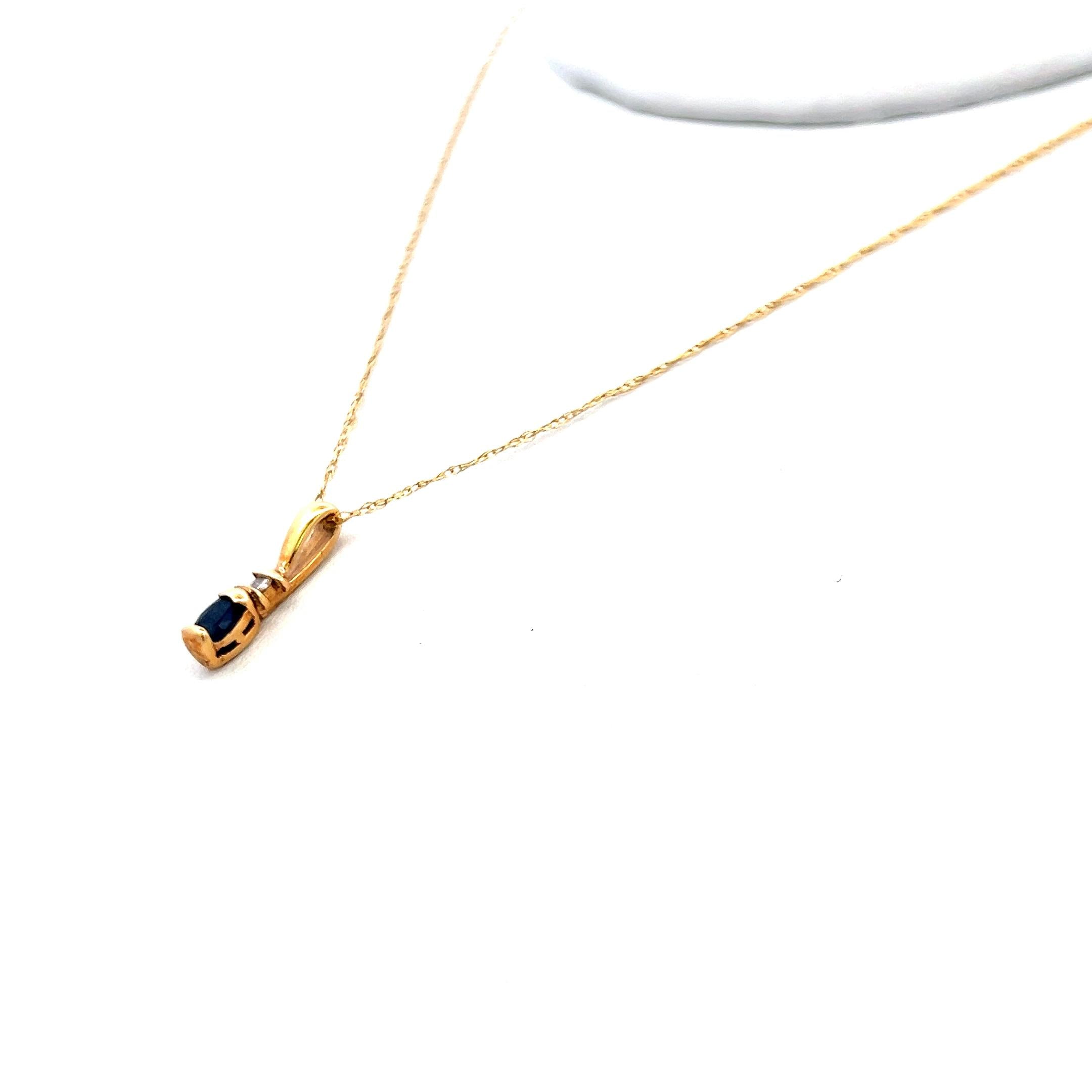 0.15 Carat Sapphire 0.03 Carat Round Diamond 14 Karat W-Gold Pendant Necklace