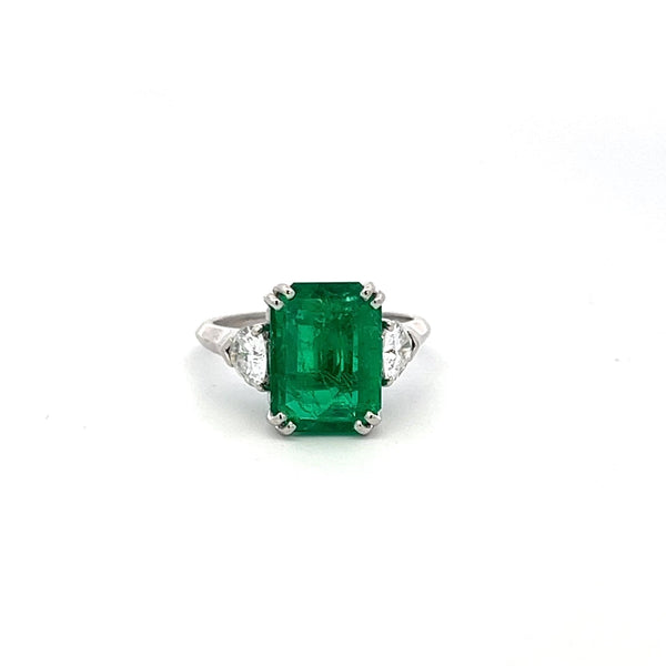 3.36 Carat Emerald 0.60 Carat Triangular Shape Diamond Platinum Engagement Ring