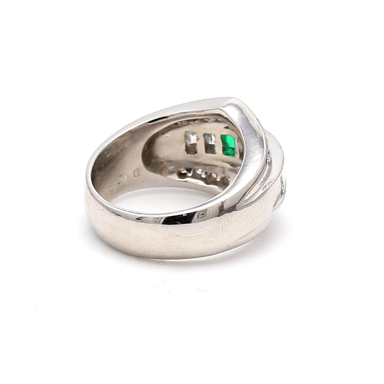 1.50 Carat Round and Emerald Cut Diamond 0.36 Carat Emerald 18K WG Band Ring