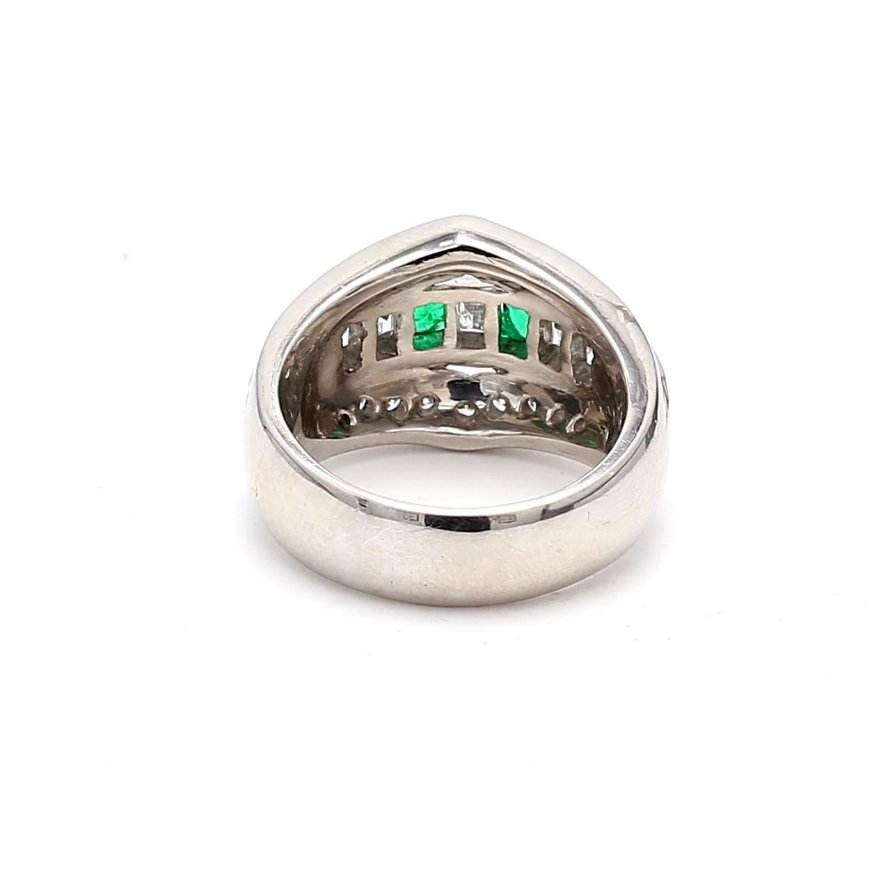 1.50 Carat Round and Emerald Cut Diamond 0.36 Carat Emerald 18K WG Band Ring