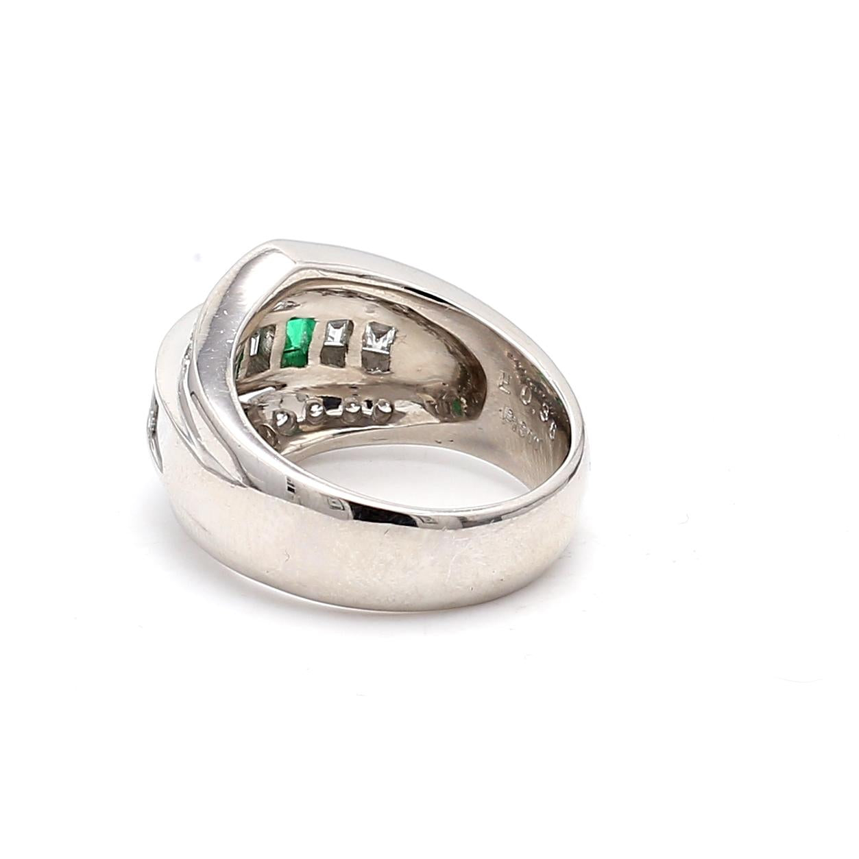 1.50 Carat Round and Emerald Cut Diamond 0.36 Carat Emerald 18K WG Band Ring