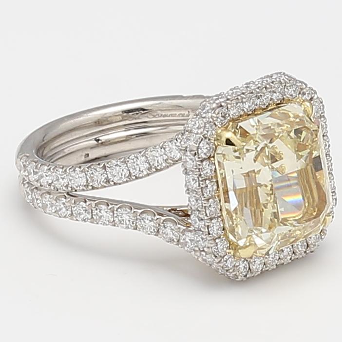 9.84 Carat Radiant Cut Fancy Yellow and Round Brilliant Diamond 18K GLD-PLT Ring