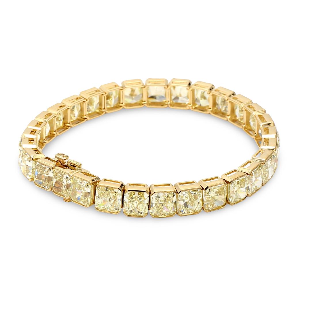 18K YG Tennis Bracelet with 43.35 Carat Radiant Cut Diamonds Fancy-lit GIA