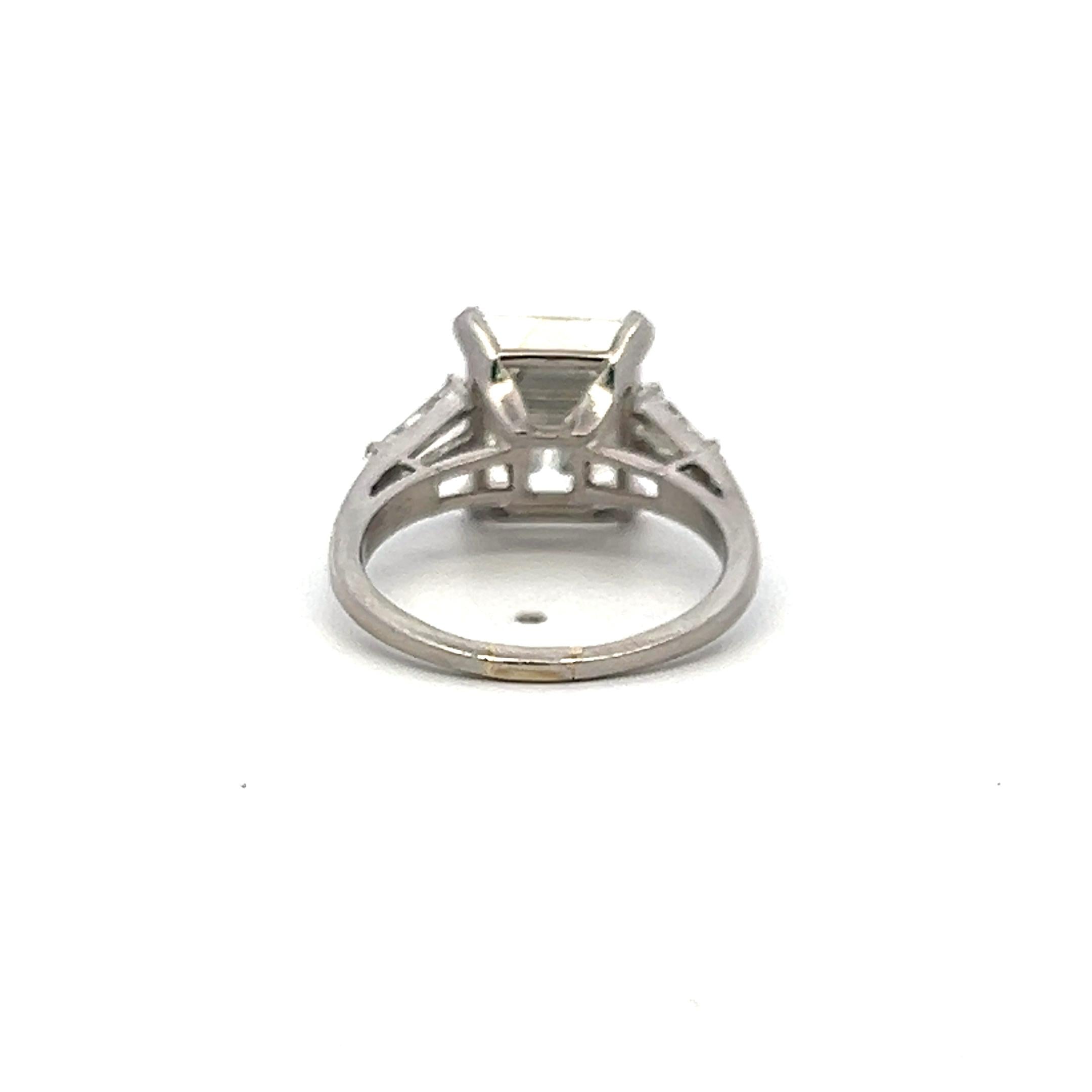 5.99 Carat Emerald Cut and Tapered Baguette Diamond Platinum Engagement Ring