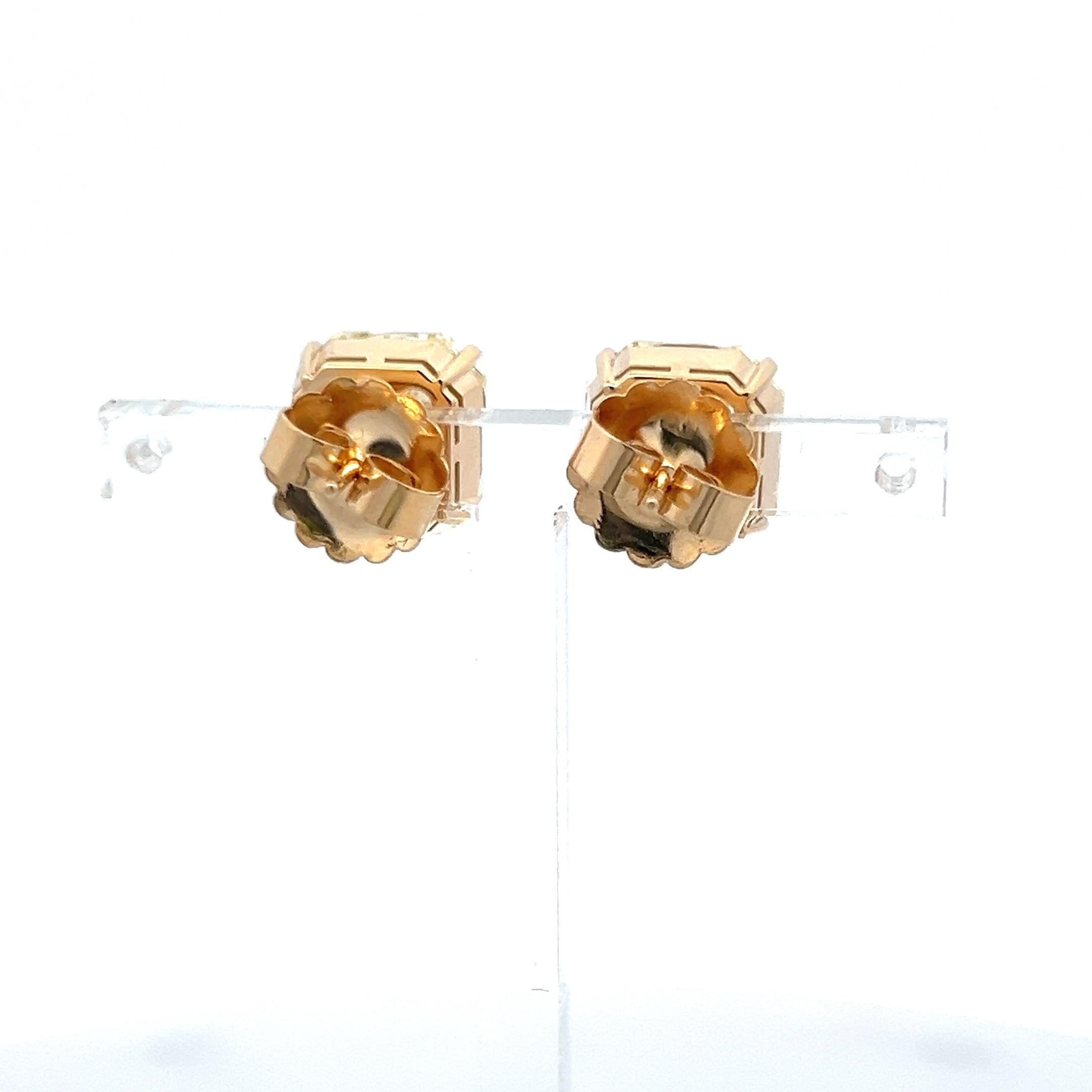 12.35 Carat Radiant Cut Fancy Yellow Diamond 18 Karat Yellow Gold Stud Earrings