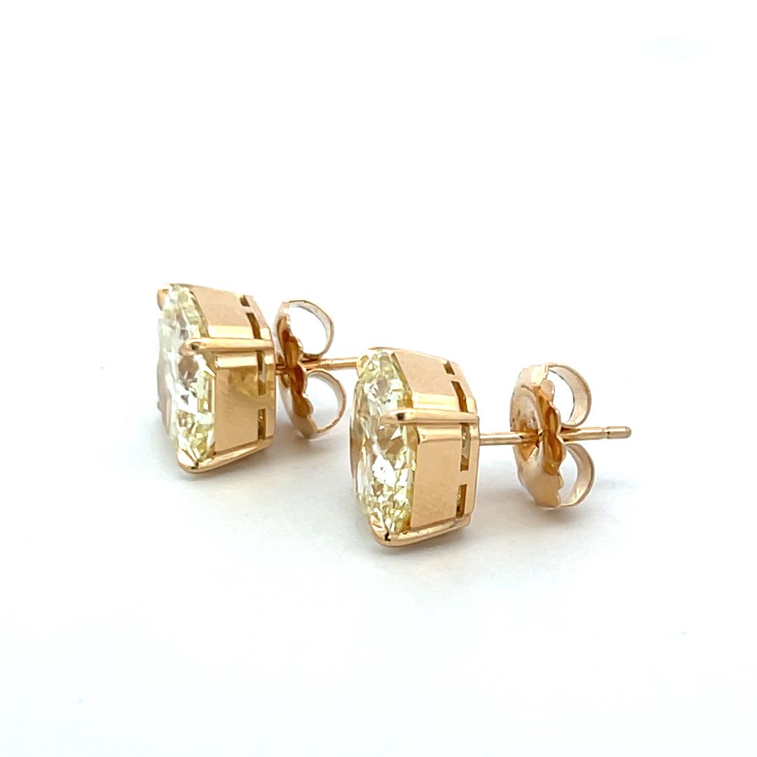 12.35 Carat Radiant Cut Fancy Yellow Diamond 18 Karat Yellow Gold Stud Earrings