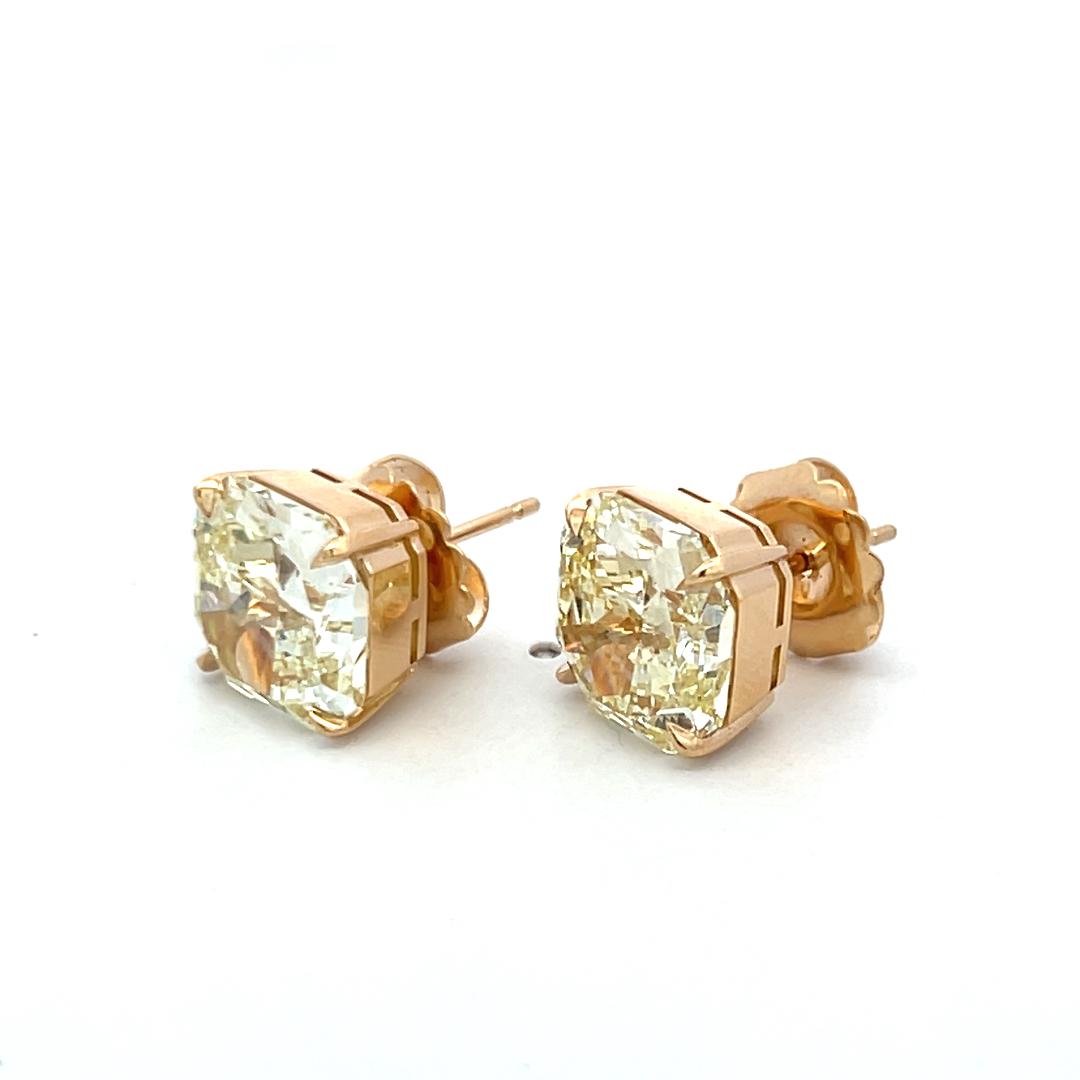 12.35 Carat Radiant Cut Fancy Yellow Diamond 18 Karat Yellow Gold Stud Earrings