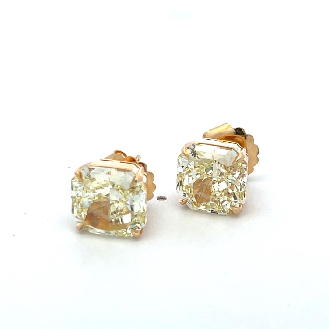 12.35 Carat Radiant Cut Fancy Yellow Diamond 18 Karat Yellow Gold Stud Earrings