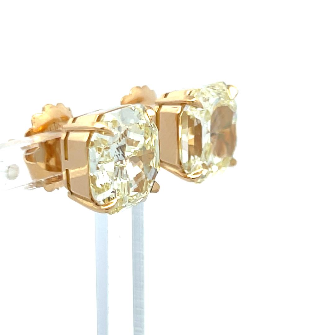 12.35 Carat Radiant Cut Fancy Yellow Diamond 18 Karat Yellow Gold Stud Earrings