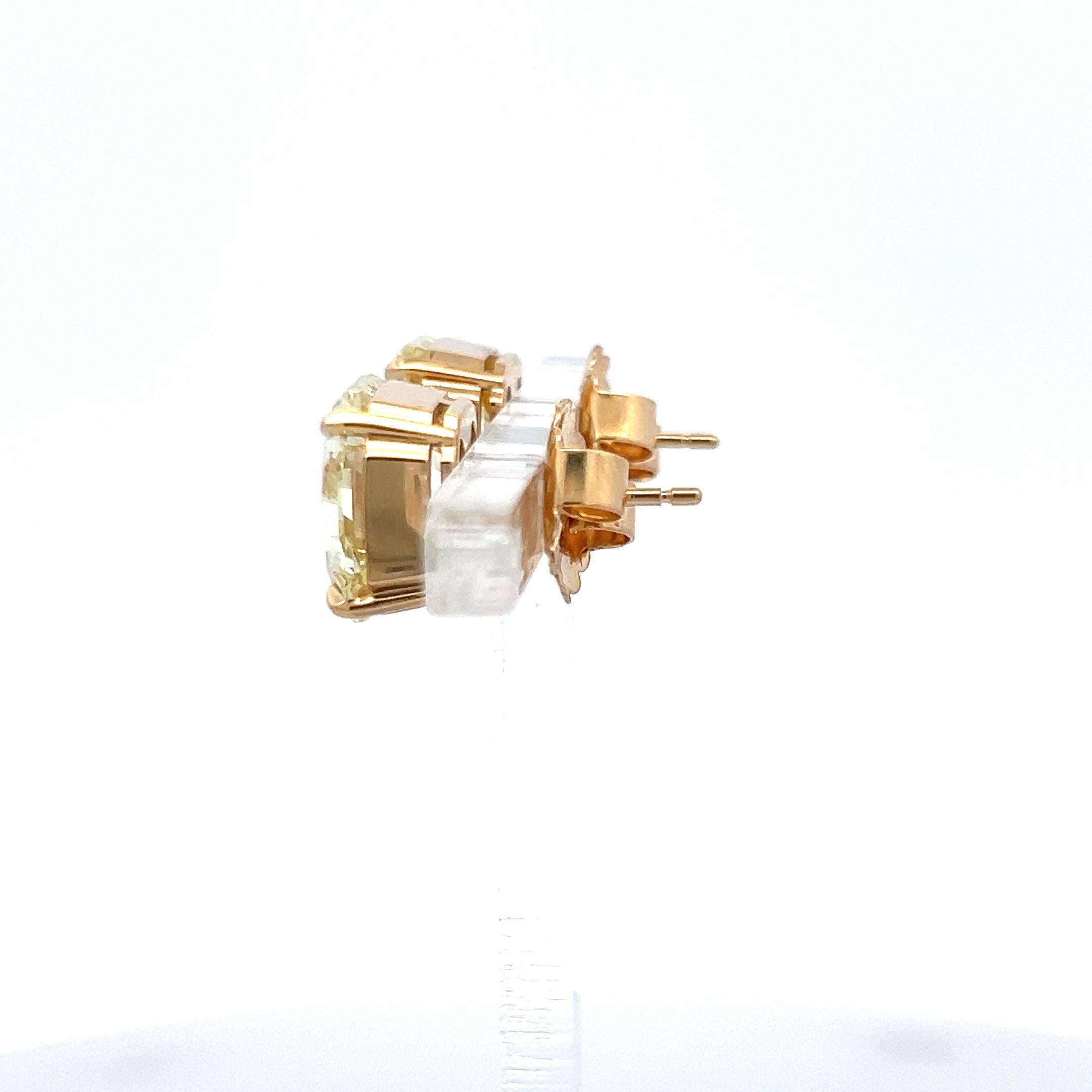 12.35 Carat Radiant Cut Fancy Yellow Diamond 18 Karat Yellow Gold Stud Earrings