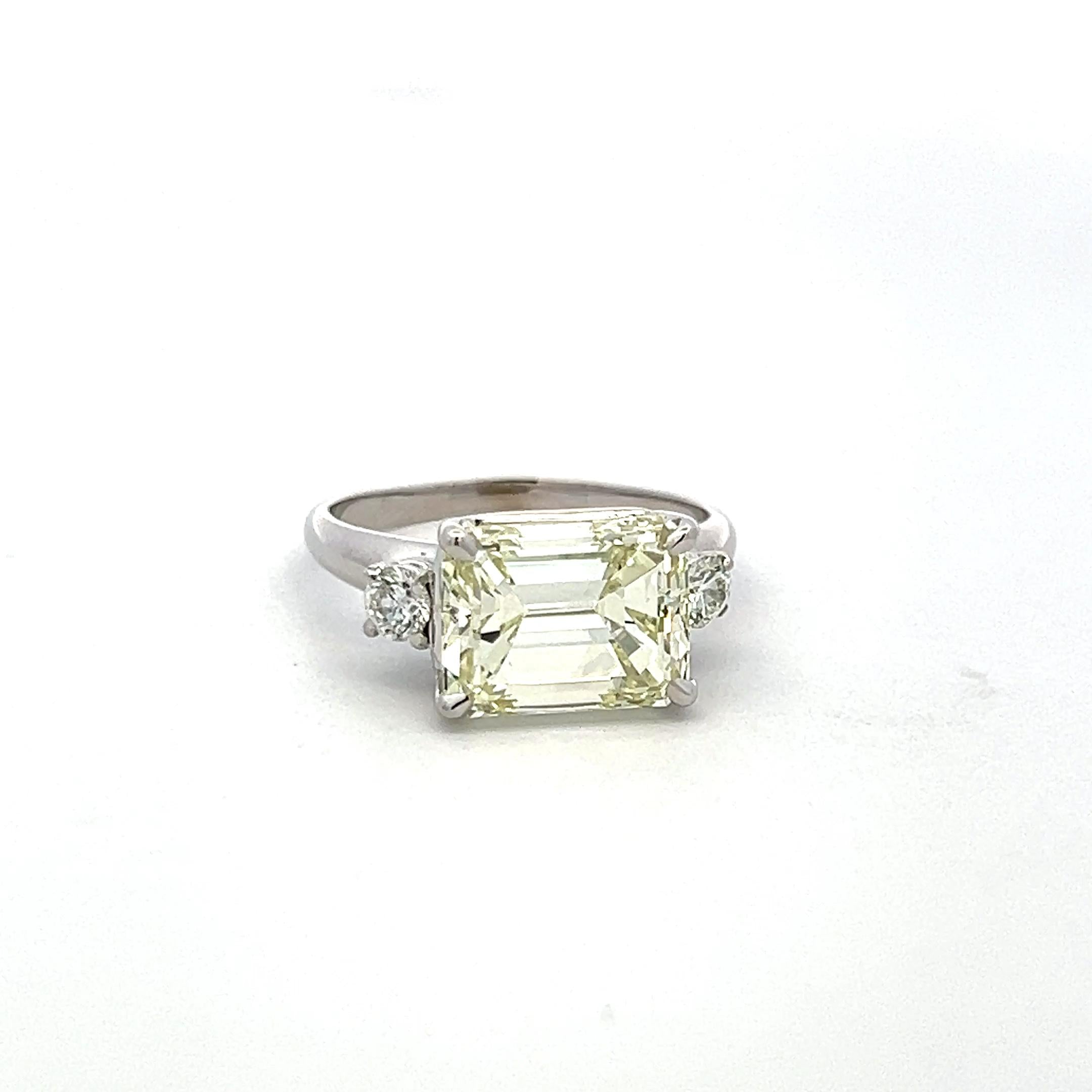 5.30 Carat Emerald Cut and Round Brilliant Diamond Platinum Engagement Ring