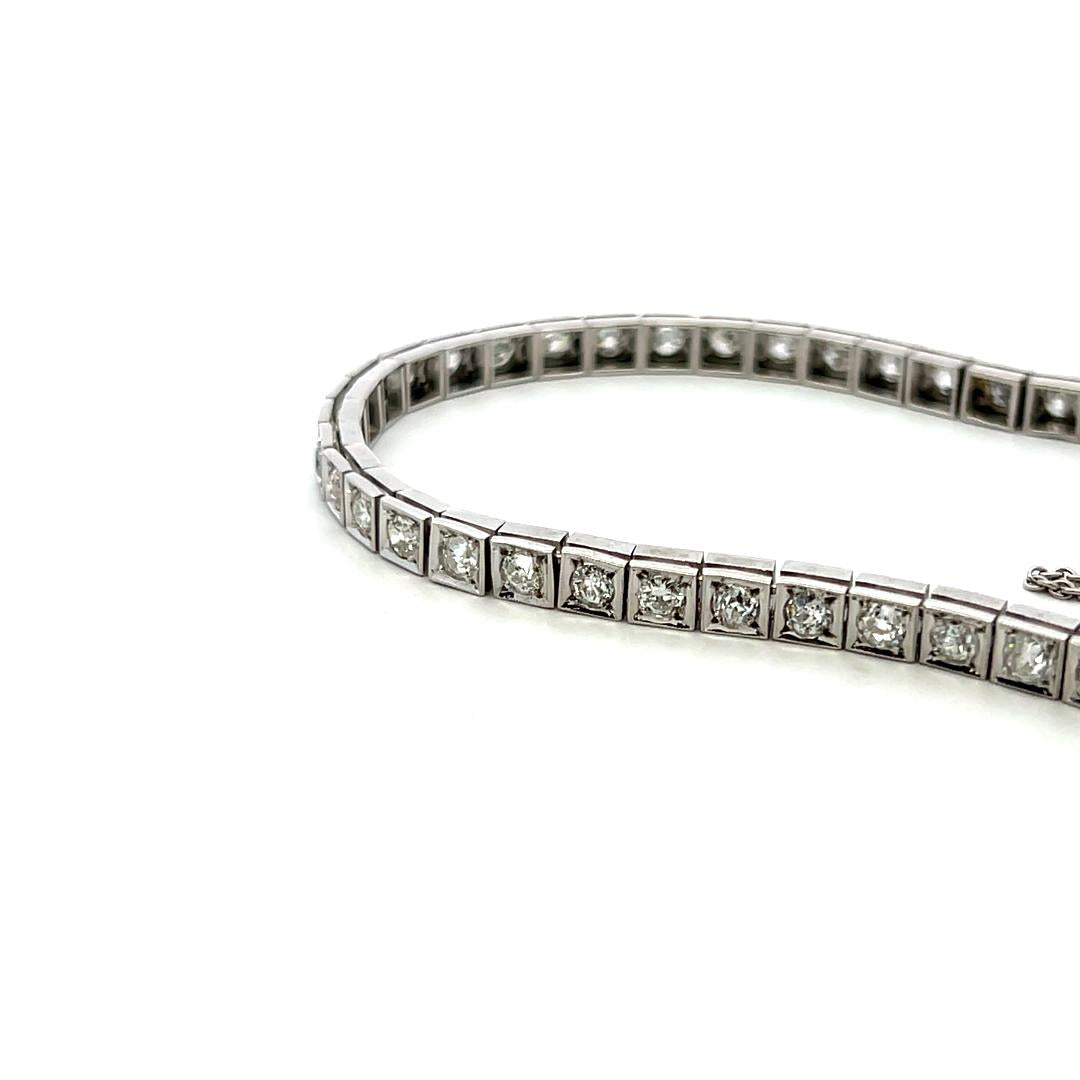 Vintage Platinum Tennis Bracelet with 4.49ct Baguette & Old European Cut Diamond