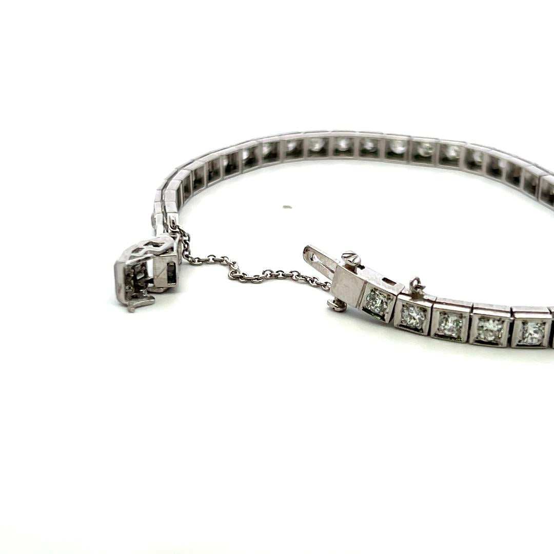 Vintage Platinum Tennis Bracelet with 4.49ct Baguette & Old European Cut Diamond