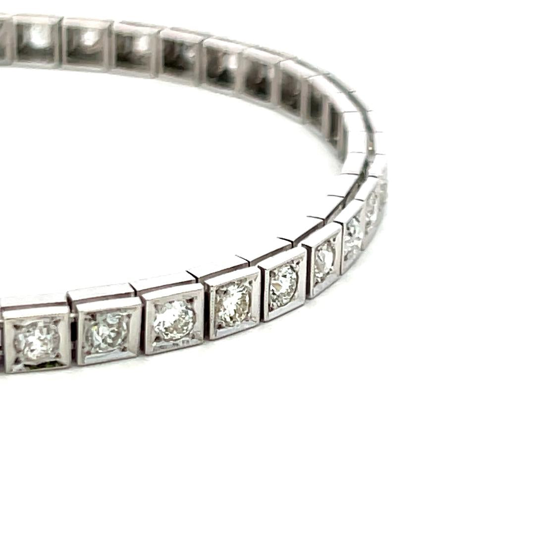 Vintage Platinum Tennis Bracelet with 4.49ct Baguette & Old European Cut Diamond