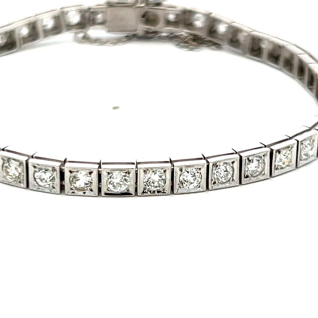 Vintage Platinum Tennis Bracelet with 4.49ct Baguette & Old European Cut Diamond