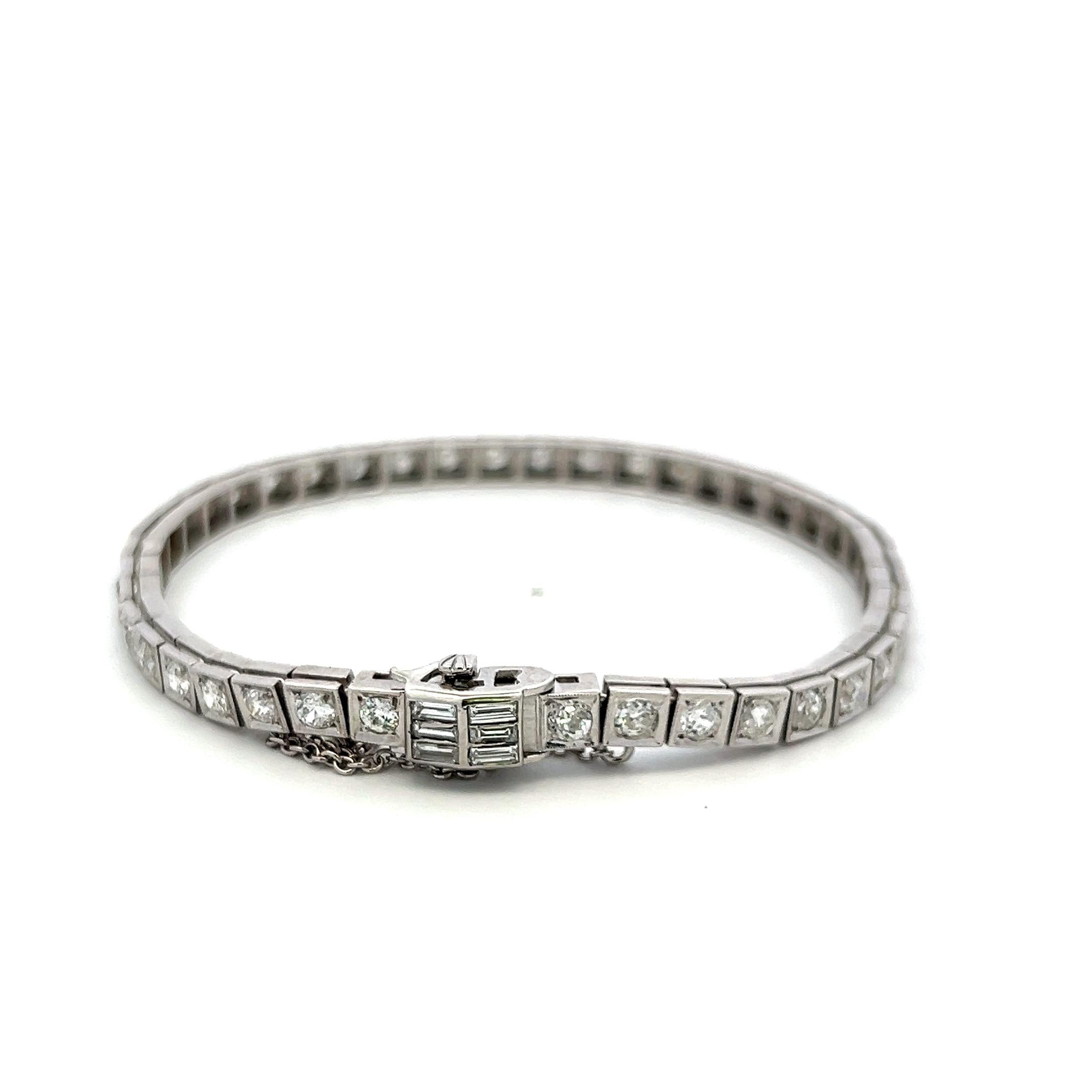 Vintage Platinum Tennis Bracelet with 4.49ct Baguette & Old European Cut Diamond