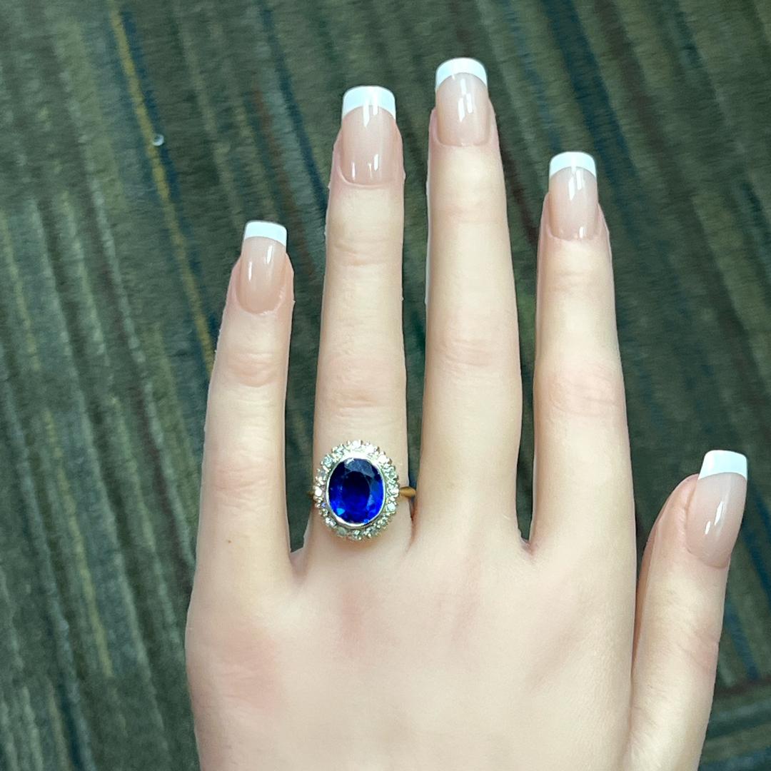 4.00 Carat Synthetic Sapphire 0.36 Carat Diamond 14K Yellow Gold Halo Ring