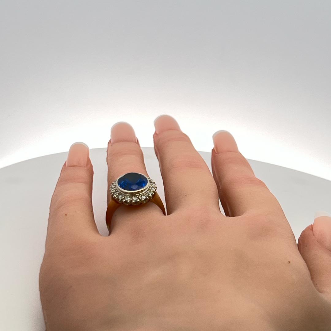 4.00 Carat Synthetic Sapphire 0.36 Carat Diamond 14K Yellow Gold Halo Ring