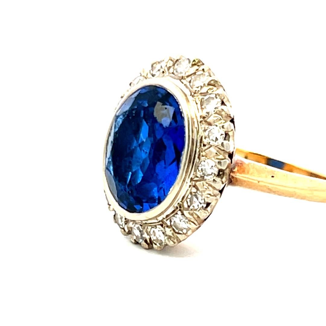 4.00 Carat Synthetic Sapphire 0.36 Carat Diamond 14K Yellow Gold Halo Ring