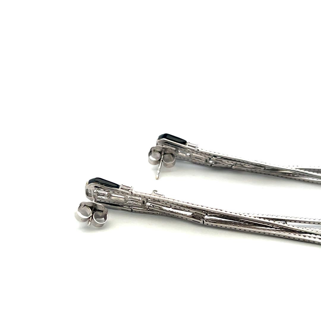 4.50 Carat Round and Baguette Diamond 18 Karat White Gold Dangling Earrings