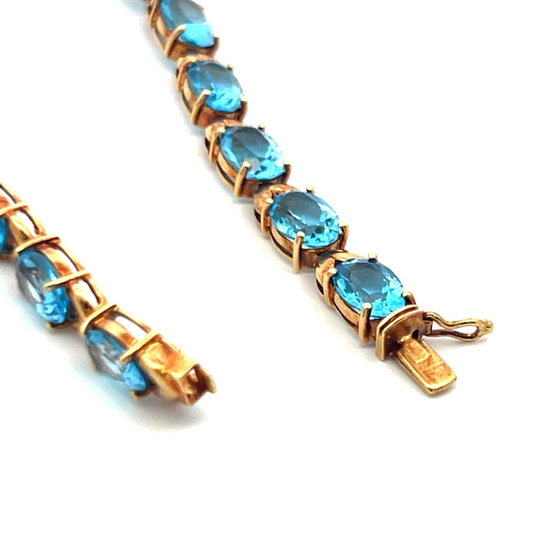 Vintage 21.00ct Oval Shape Blue Topaz Tennis Bracelet in 18K Yellow Gold