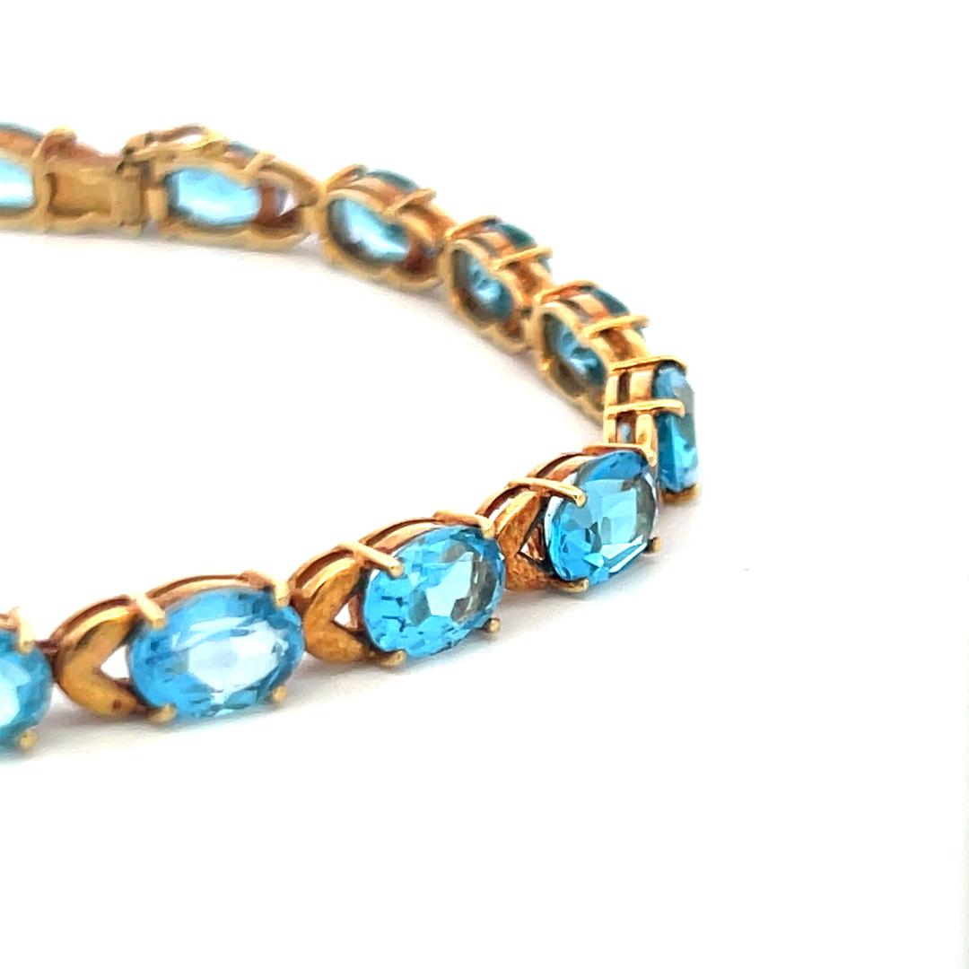 Vintage 21.00ct Oval Shape Blue Topaz Tennis Bracelet in 18K Yellow Gold