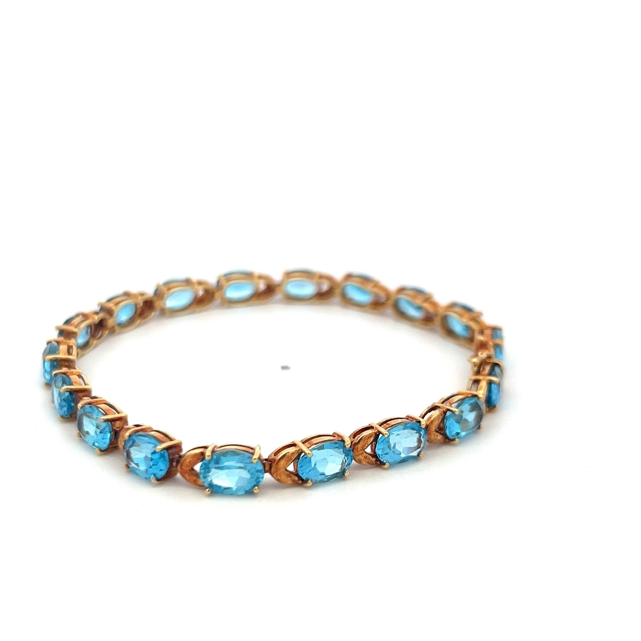 Vintage 21.00ct Oval Shape Blue Topaz Tennis Bracelet in 18K Yellow Gold