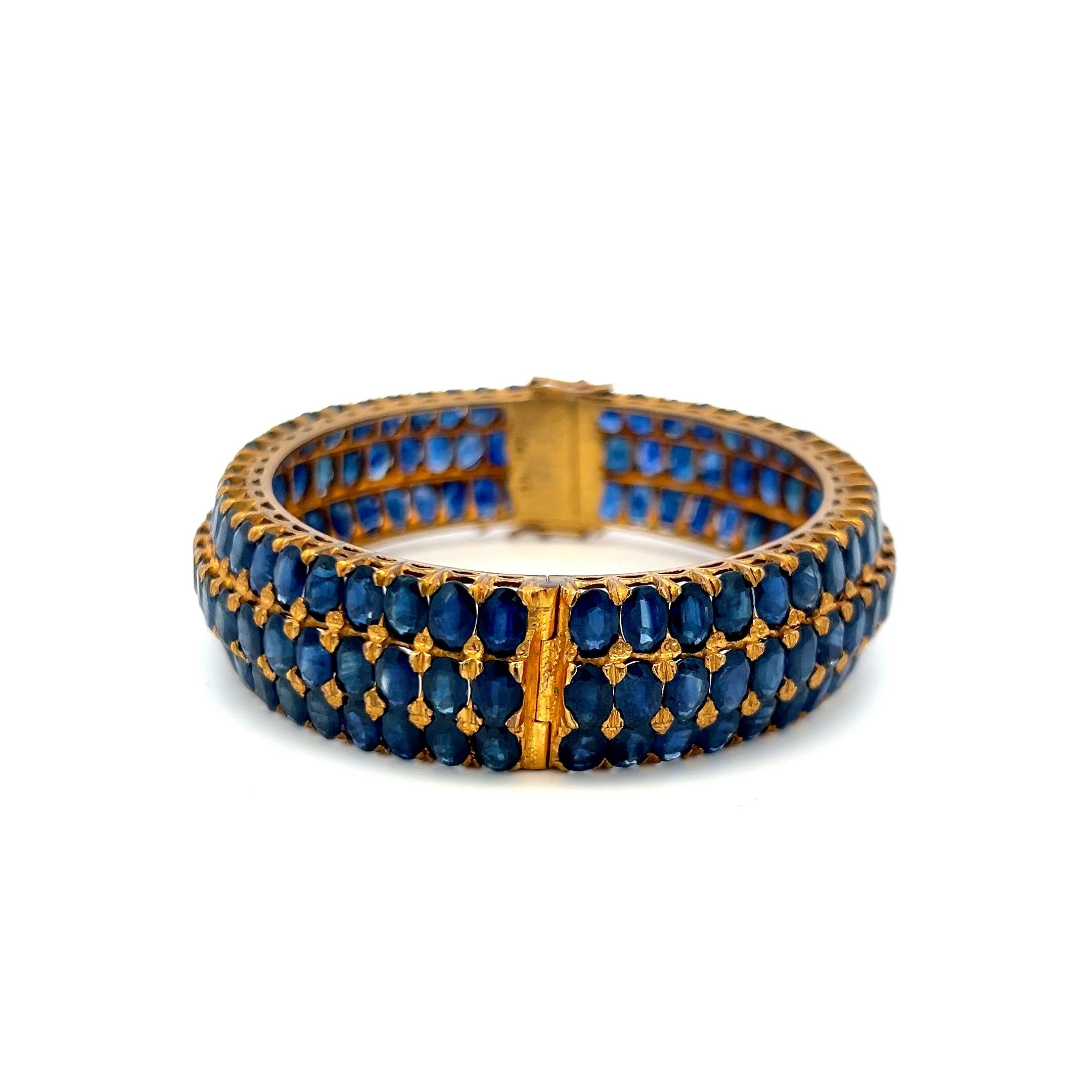 18K Yellow Gold Bangle Bracelet with 75 Carat Oval Sapphire Gemstones