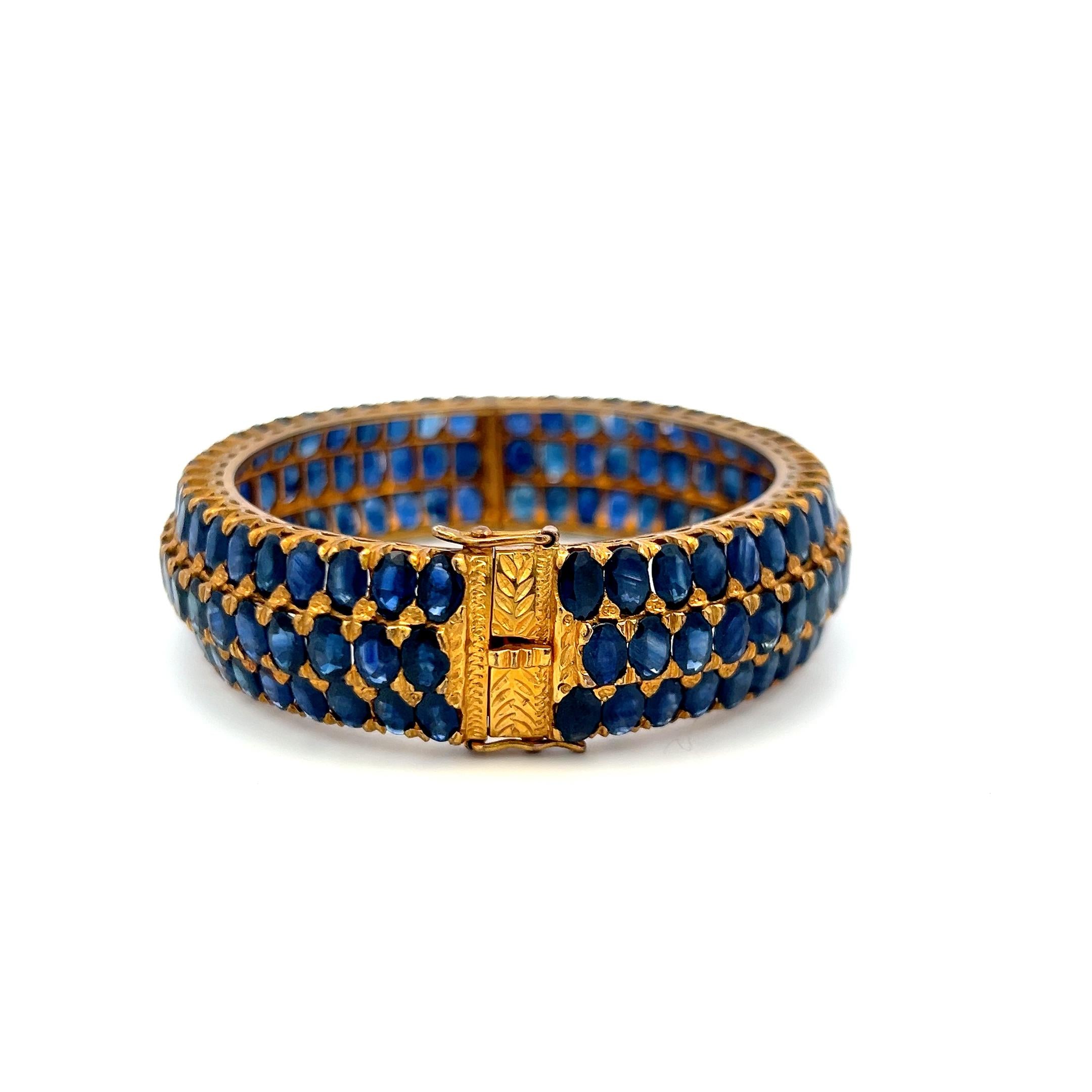 18K Yellow Gold Bangle Bracelet with 75 Carat Oval Sapphire Gemstones