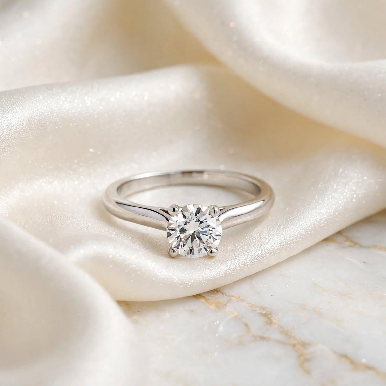 Cartier Platinum Engagement Ring with 0.74 Carat Round Diamond G VVS2 GIA