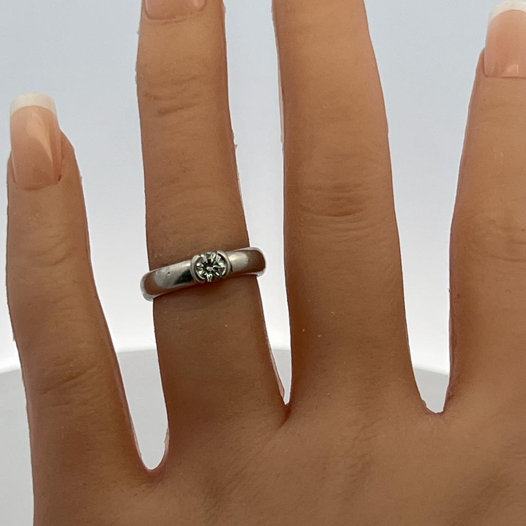 Tiffany & Co Vintage Platinum Engagement Ring with 0.3 Carat Round F VS Diamond