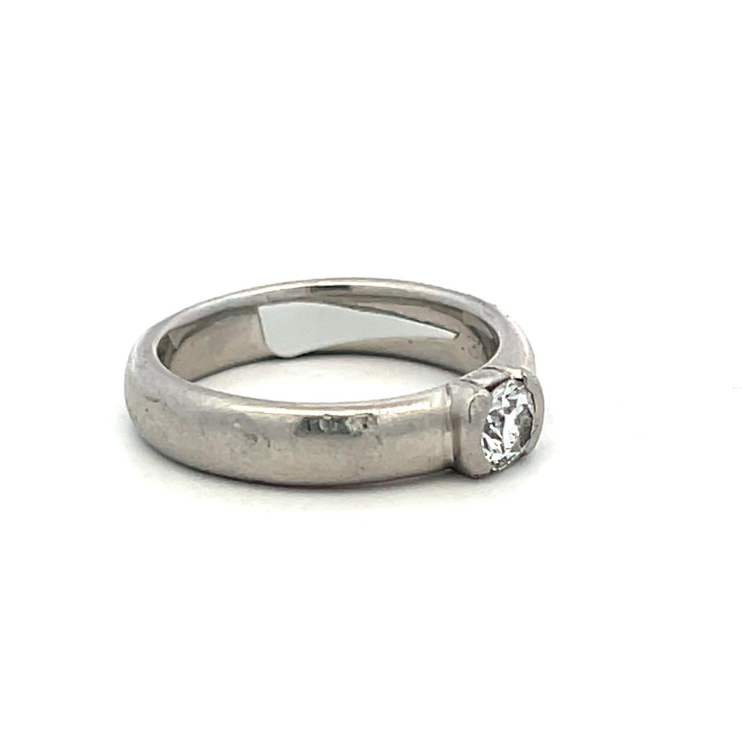 Tiffany & Co Vintage Platinum Engagement Ring with 0.3 Carat Round F VS Diamond
